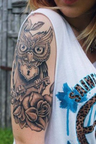 Cute Owl Tattoo Holding Lock And Key