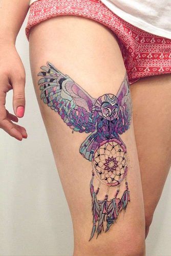 Colorful Owl Carrying Dream Catcher Tattoo