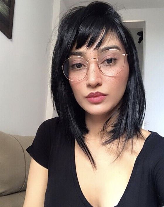 Long black bob with a classic fringe, a cool idea for a modern look, and a classic fringe will beautifully highlight the face