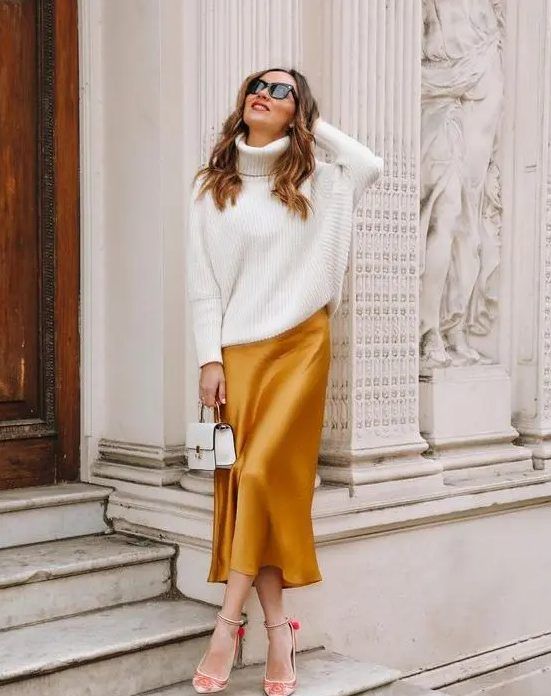 Marigold slip midi dress, oversized white sweater, red embroidered shoes, and a small white bag